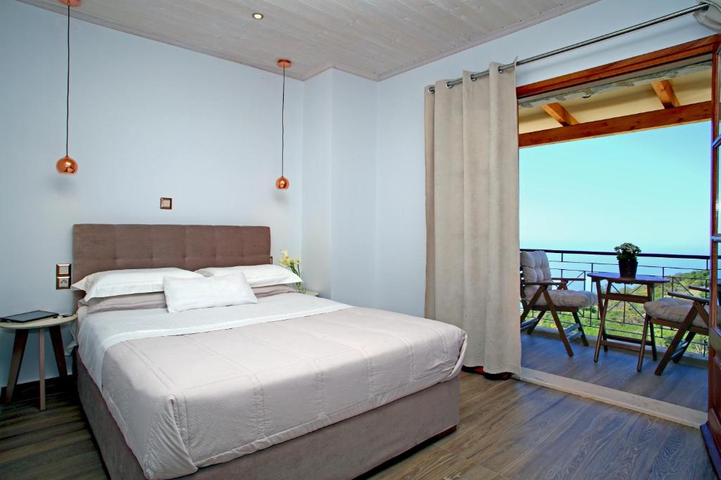 Posteľ alebo postele v izbe v ubytovaní Panorama Villas