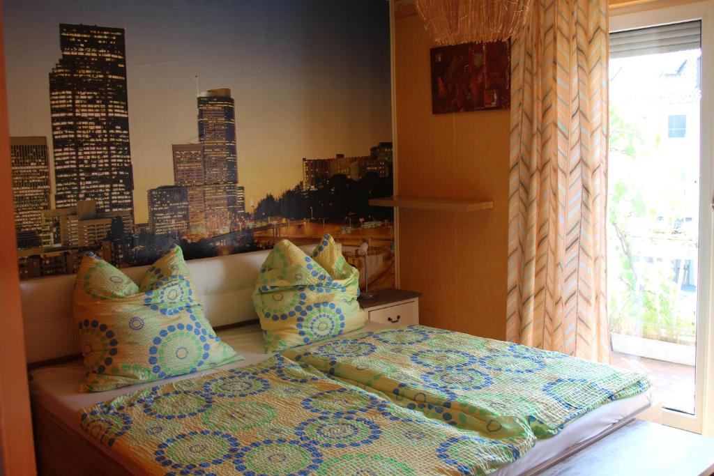 Ένα ή περισσότερα κρεβάτια σε δωμάτιο στο Lila Villa Schwenningen