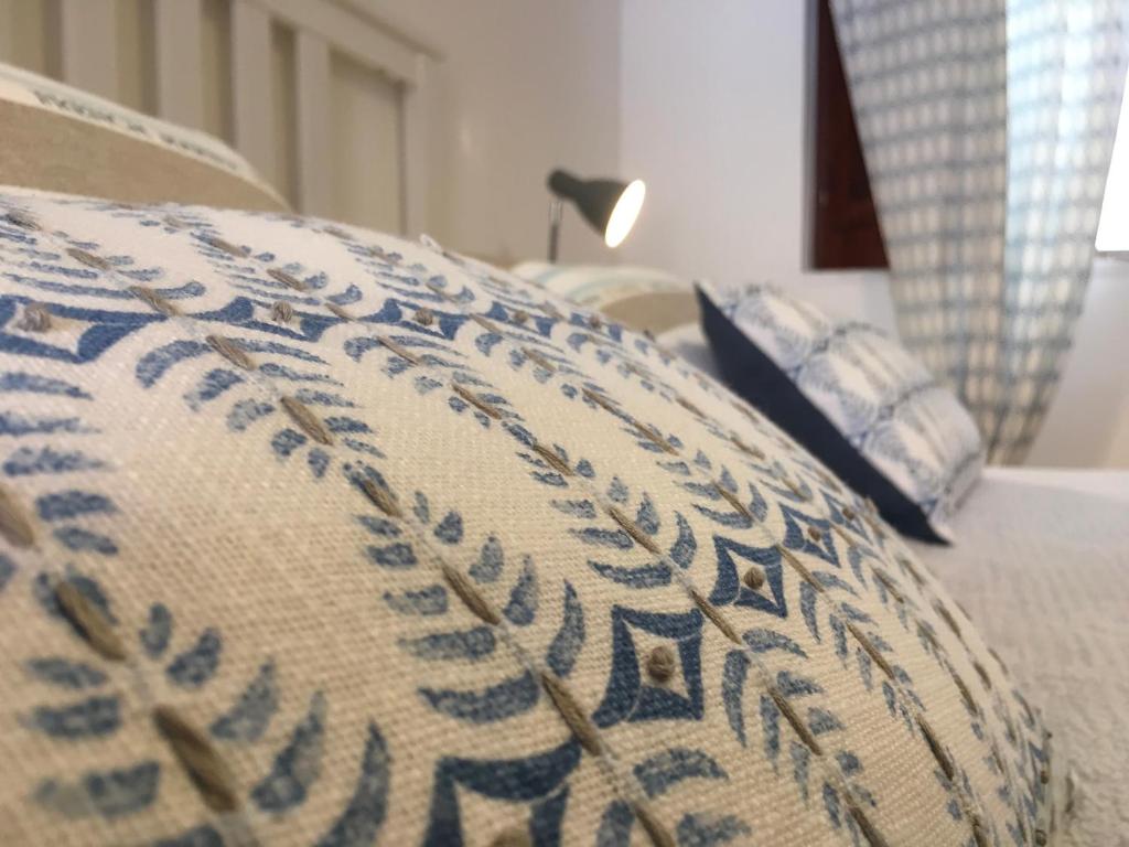 Postel nebo postele na pokoji v ubytování La casa Rosa