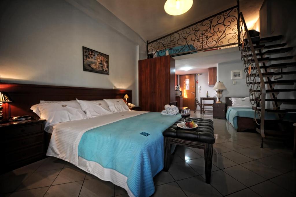 Posteľ alebo postele v izbe v ubytovaní Irida Beach Resort Suites