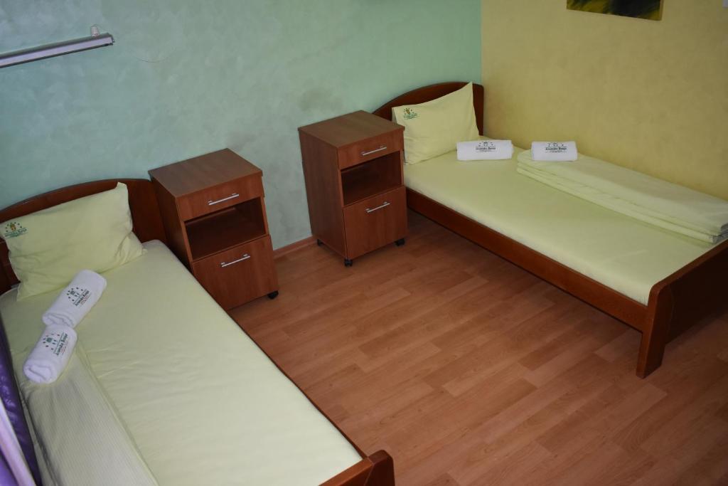 Postel nebo postele na pokoji v ubytování Clinic for Rehabilitation Vujan
