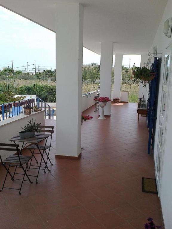 A balcony or terrace at La Caletta Bed and Breakfast