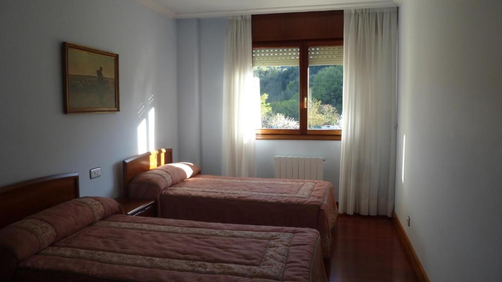 Posteľ alebo postele v izbe v ubytovaní Casa Respal EVI00158