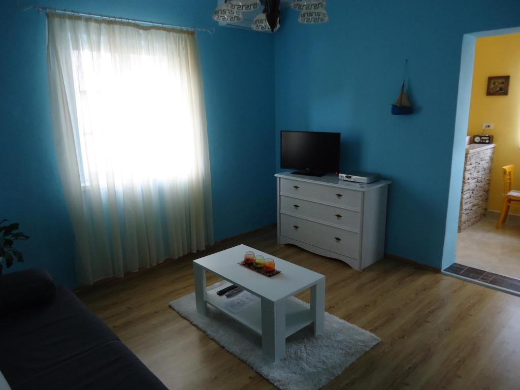 TV a/nebo společenská místnost v ubytování Apartment Milat