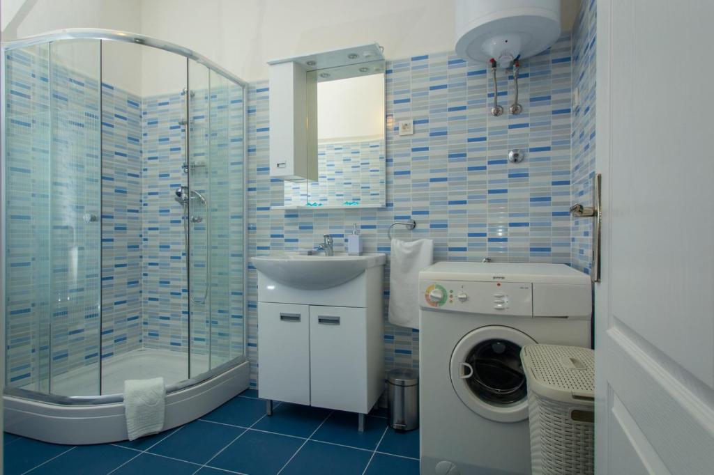 Koupelna v ubytování Apartment Milat