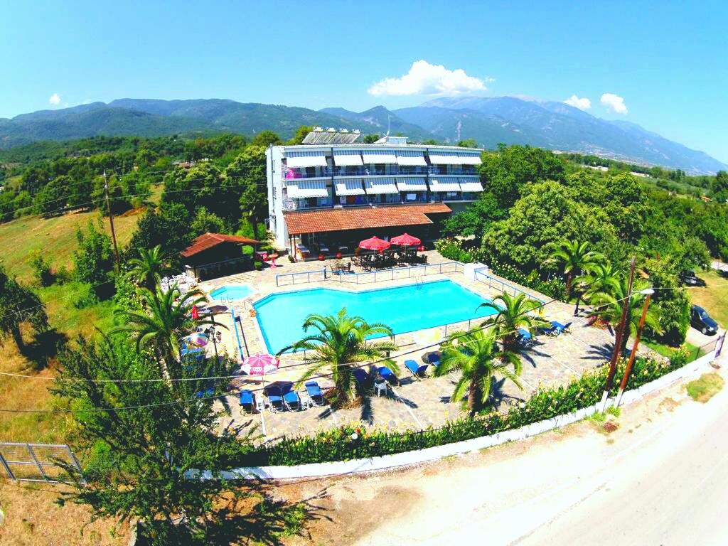 an aerial view of a resort with a swimming pool at Hotel Pantazis in Paralia Panteleimonos