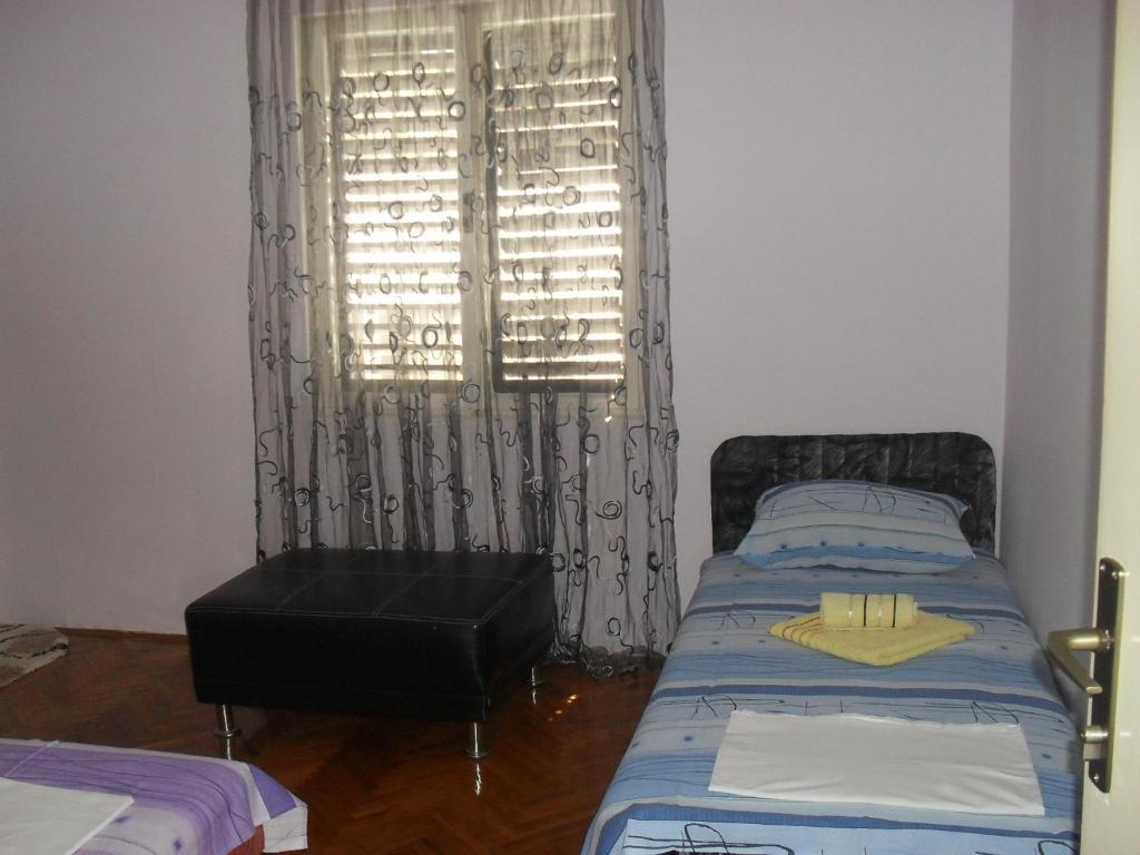 Posteľ alebo postele v izbe v ubytovaní Apartment Batricevic