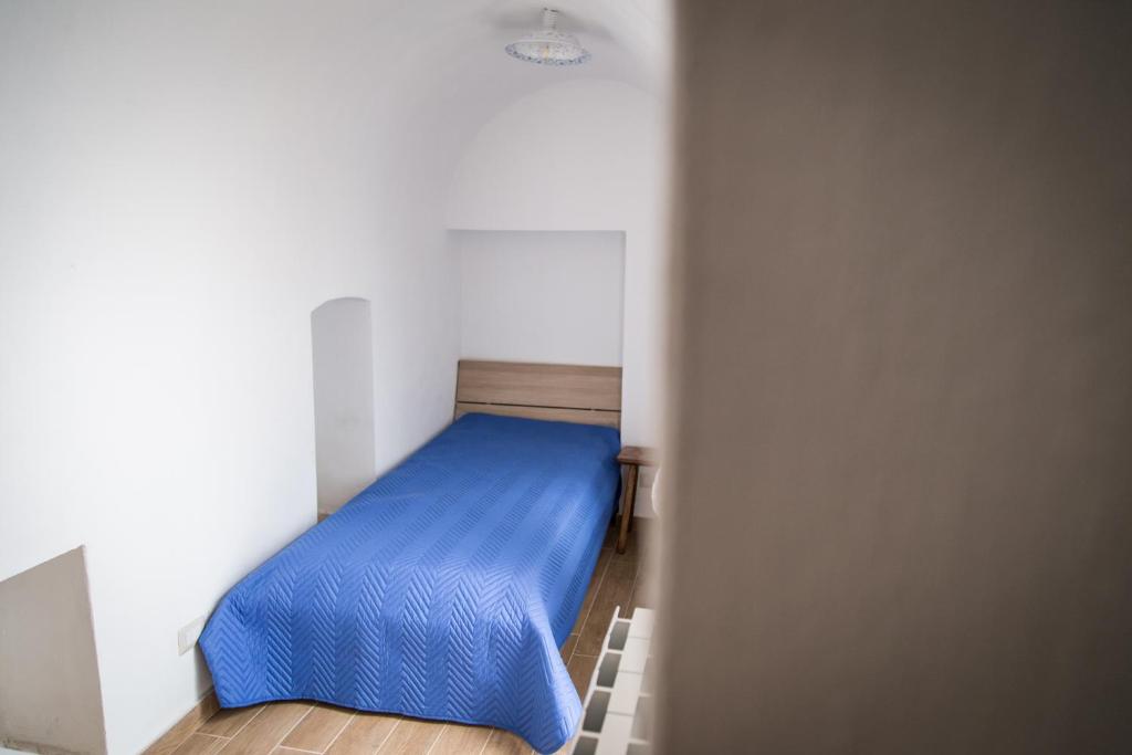 A bed or beds in a room at Vico Marina