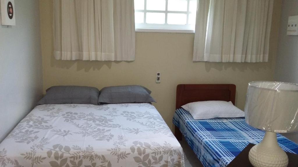 Postel nebo postele na pokoji v ubytování Chalé Porto dos Lençóis