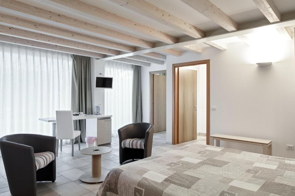 Postel nebo postele na pokoji v ubytování B&B Agorà