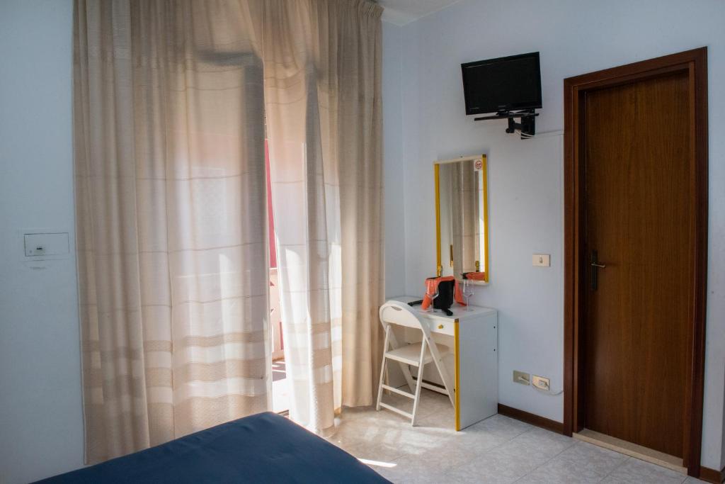 TV a/nebo společenská místnost v ubytování Hotel Malibran