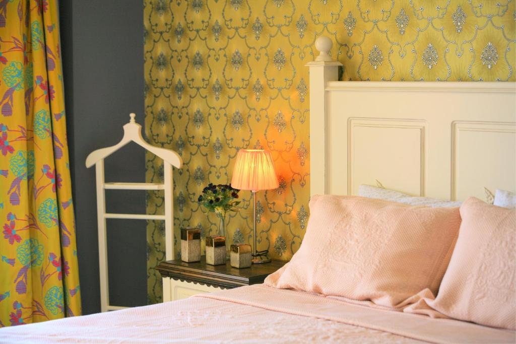 Postel nebo postele na pokoji v ubytování Nilüfer Butik Otel