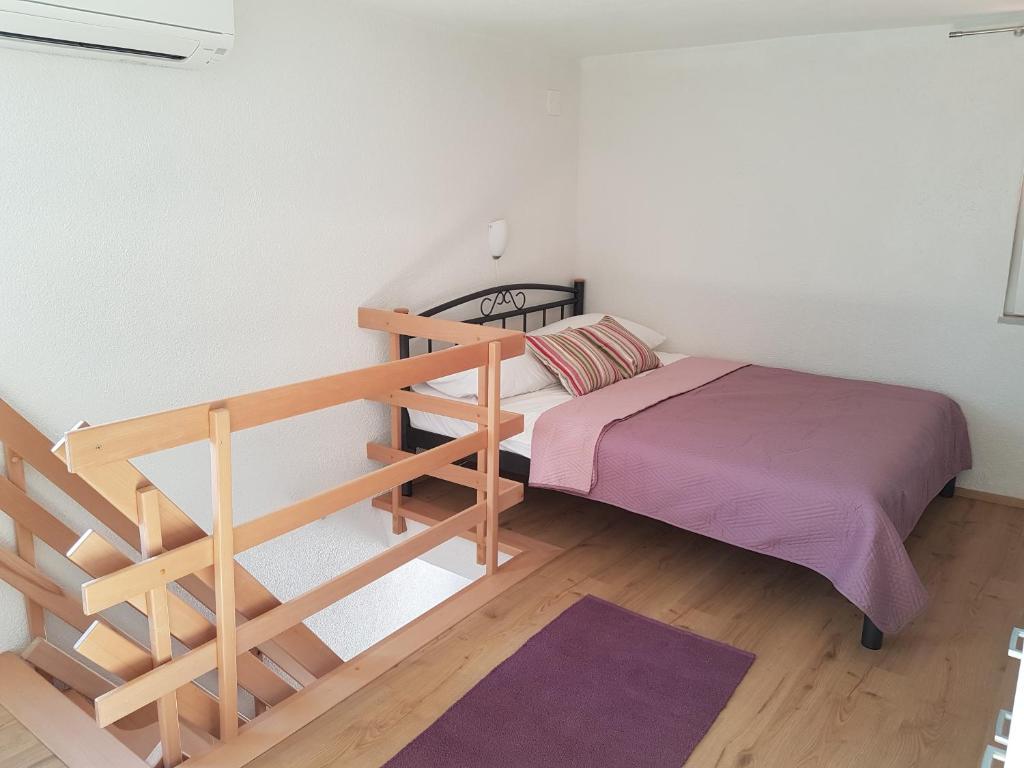 Ένα ή περισσότερα κρεβάτια σε δωμάτιο στο Apartment Lux Star