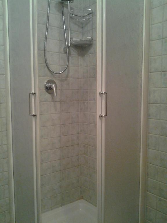 Koupelna v ubytování Hotel Brufa
