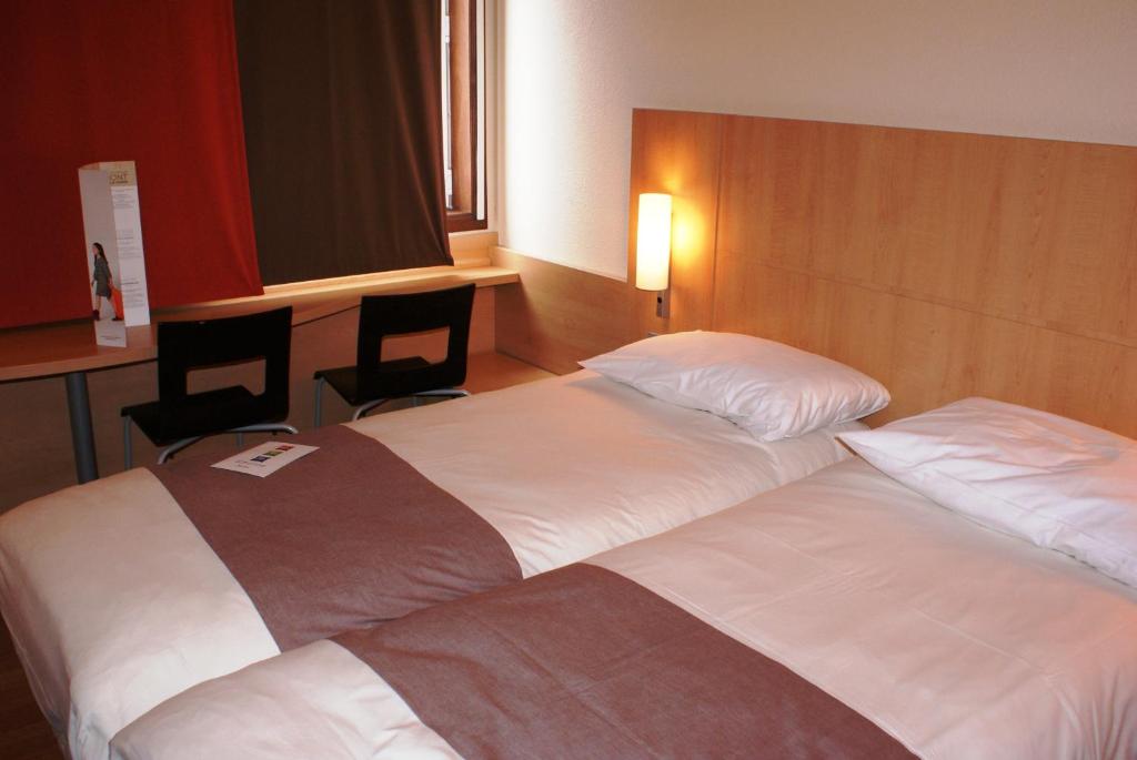 Postel nebo postele na pokoji v ubytování ibis Hotel Brussels Expo Atomium
