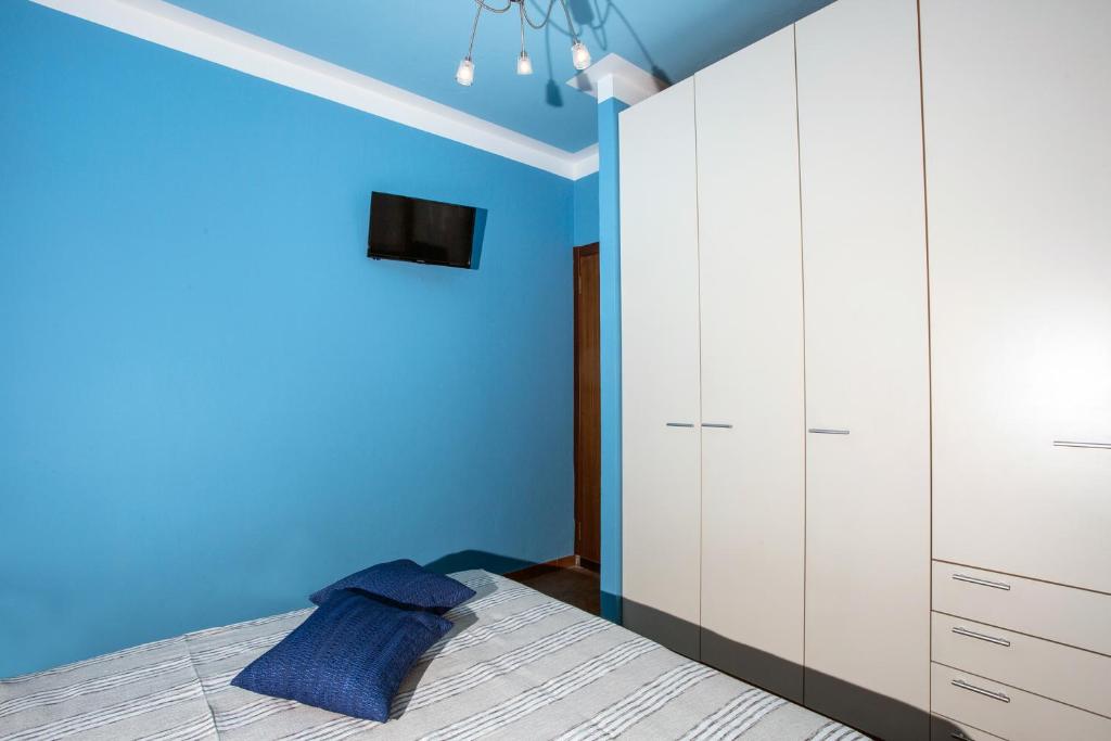 Postel nebo postele na pokoji v ubytování Casa Vacanze La Nautica