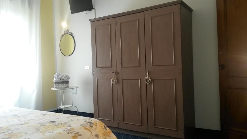 Postel nebo postele na pokoji v ubytování Albergo al Sole