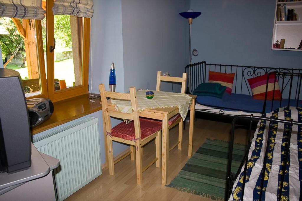 Postel nebo postele na pokoji v ubytování Apartma Obrh