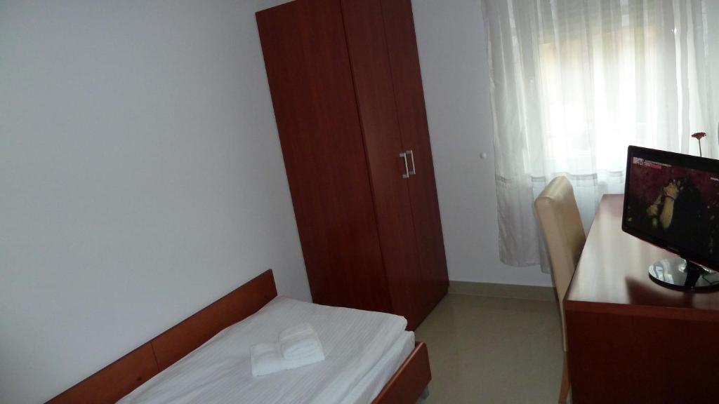 Postel nebo postele na pokoji v ubytování Guesthouse Villa Inn