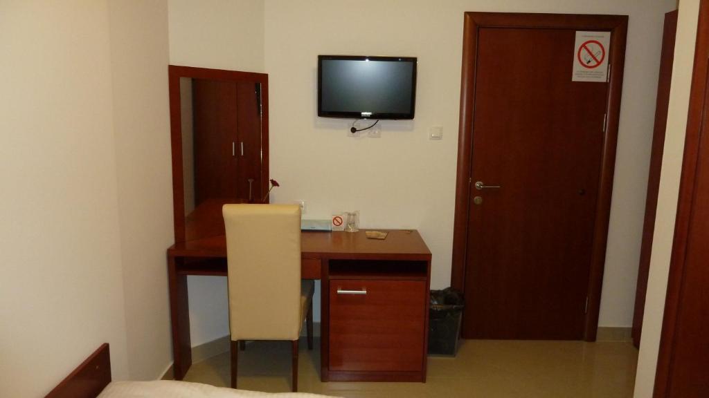 TV a/nebo společenská místnost v ubytování Guesthouse Villa Inn