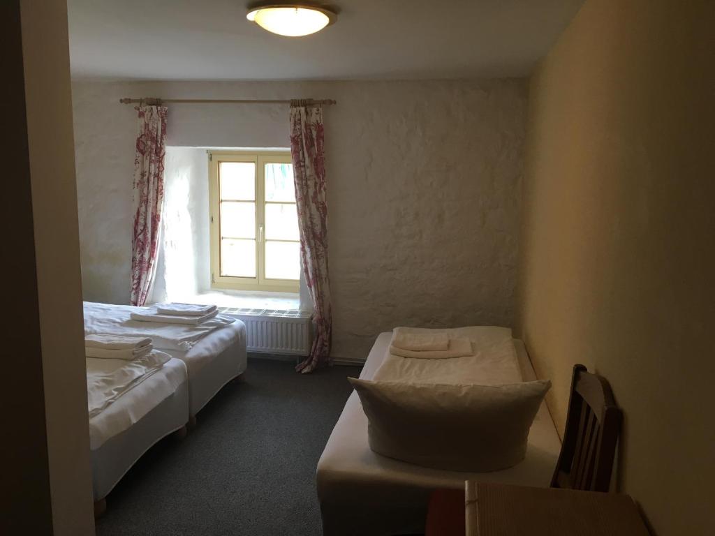 Postel nebo postele na pokoji v ubytování Kloster Hedersleben