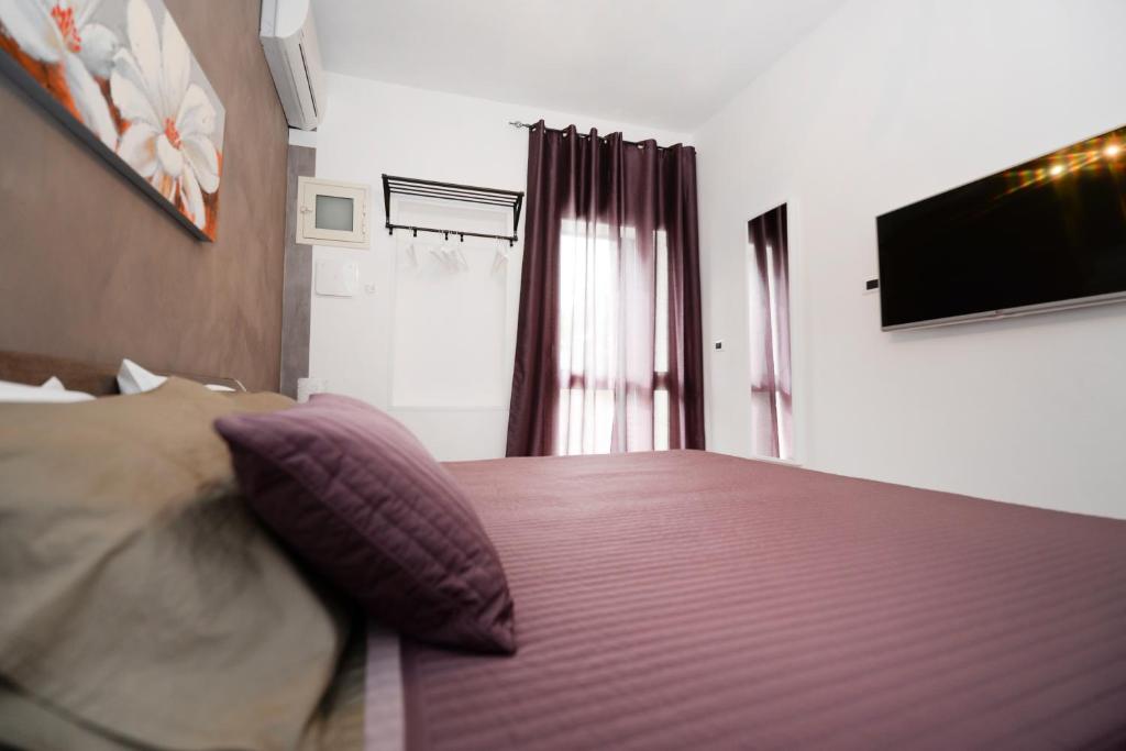 Postel nebo postele na pokoji v ubytování Bed and Breakfast Alberini