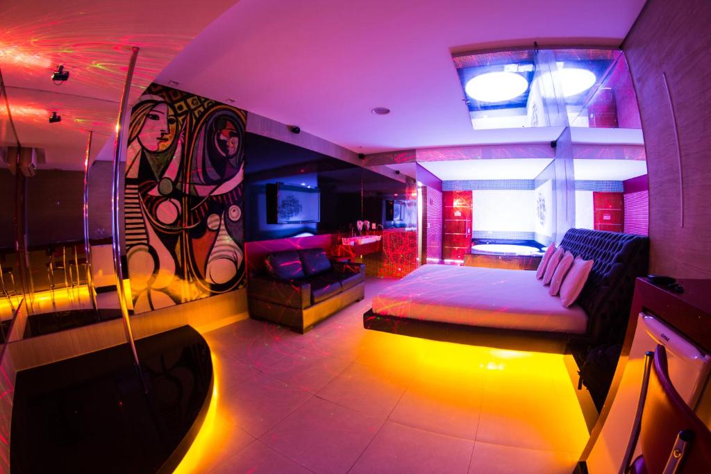 Postel nebo postele na pokoji v ubytování Arte Motel (Adults Only)