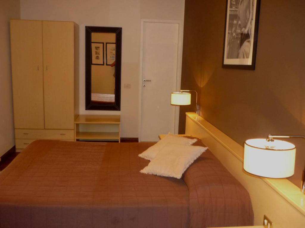 Postel nebo postele na pokoji v ubytování Hotel Ancora Riviera