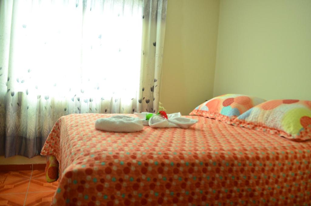 Postel nebo postele na pokoji v ubytování Rosenverg B&B Tours