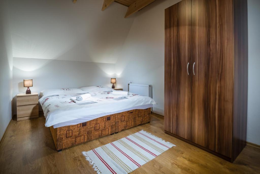 Postel nebo postele na pokoji v ubytování Vila Viktoria