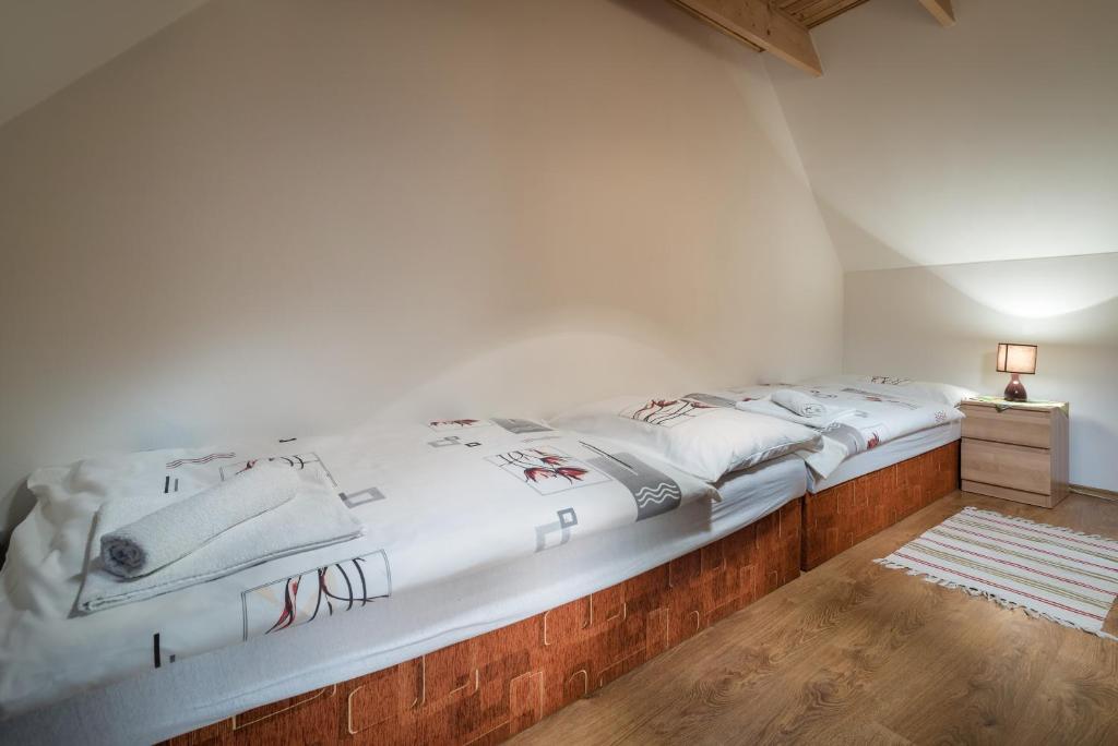 Postel nebo postele na pokoji v ubytování Vila Viktoria
