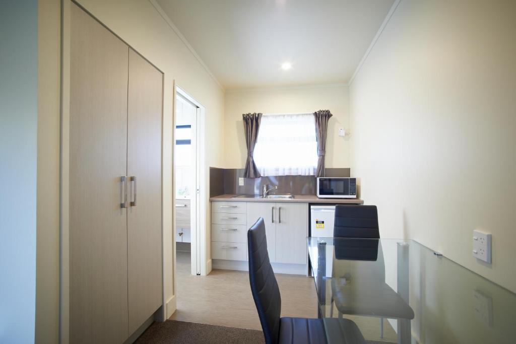 Kuchyň nebo kuchyňský kout v ubytování Auto Lodge Motel