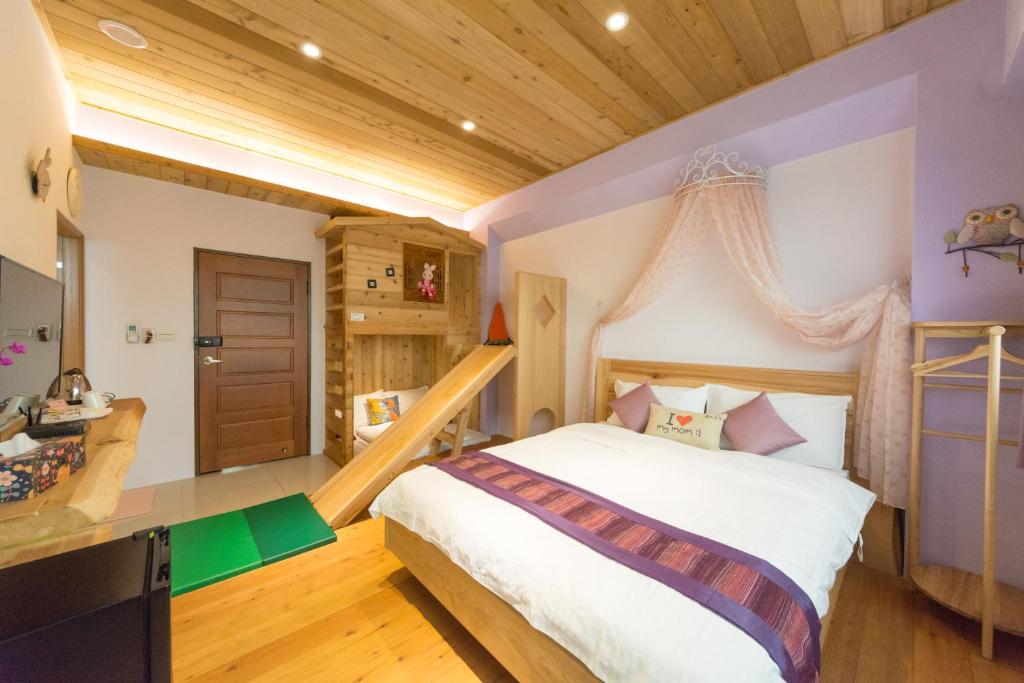Postel nebo postele na pokoji v ubytování Shang Shui Yun Ji B&B
