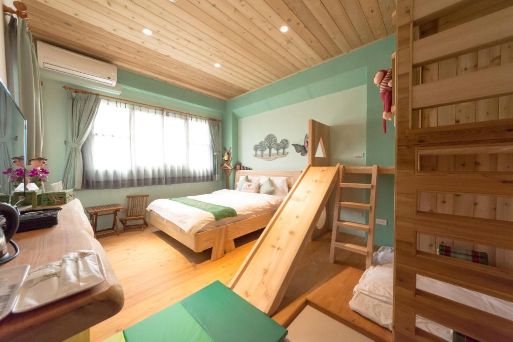 Postel nebo postele na pokoji v ubytování Shang Shui Yun Ji B&B