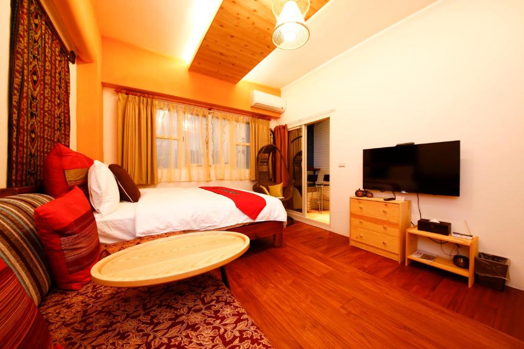TV a/nebo společenská místnost v ubytování Tang Chao B&B