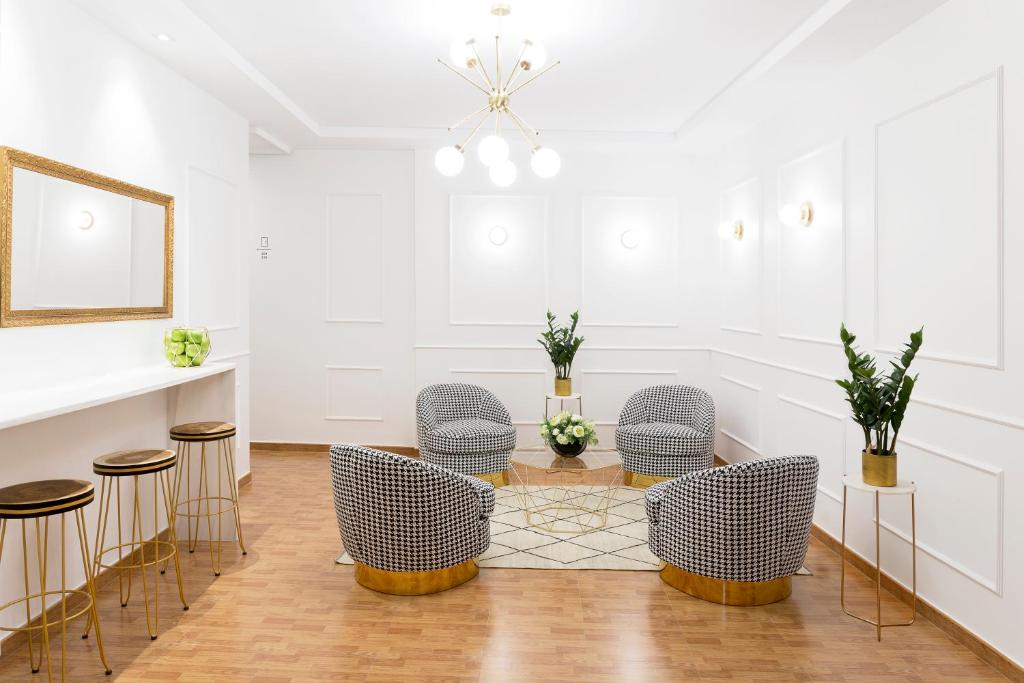 Posezení v ubytování Hostal Oriente