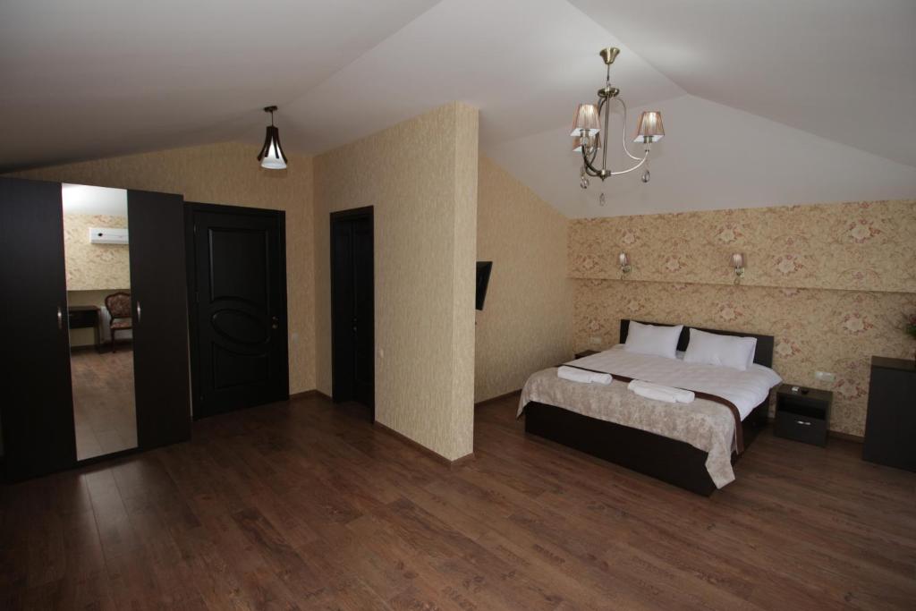Postel nebo postele na pokoji v ubytování MariaLuis Hotel