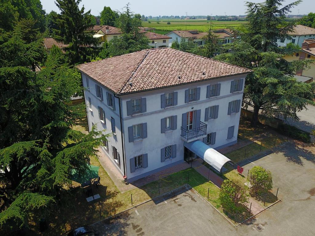 an overhead view of a large white building at Hotel Sporting in Campagnola Emilia