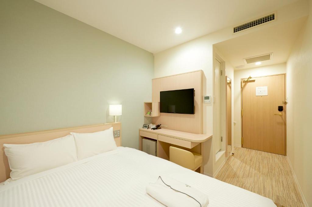 TV a/nebo společenská místnost v ubytování Sotetsu Fresa Inn Tokyo Tamachi