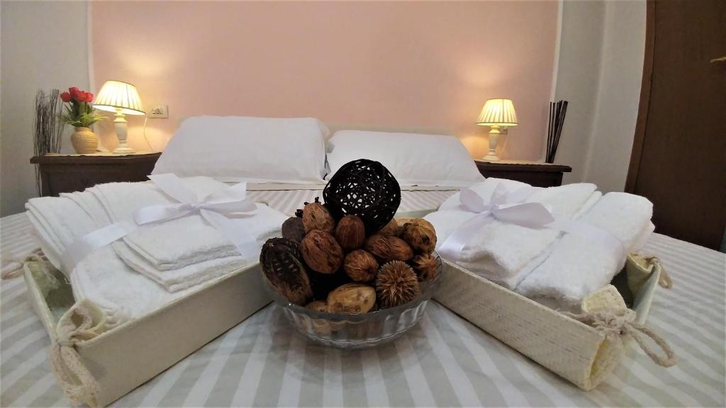 Llit o llits en una habitació de Dreaming Navona Rooms