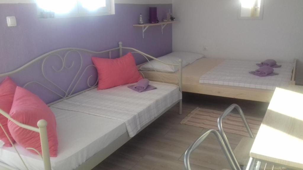Posteľ alebo postele v izbe v ubytovaní Gospodar Apartments