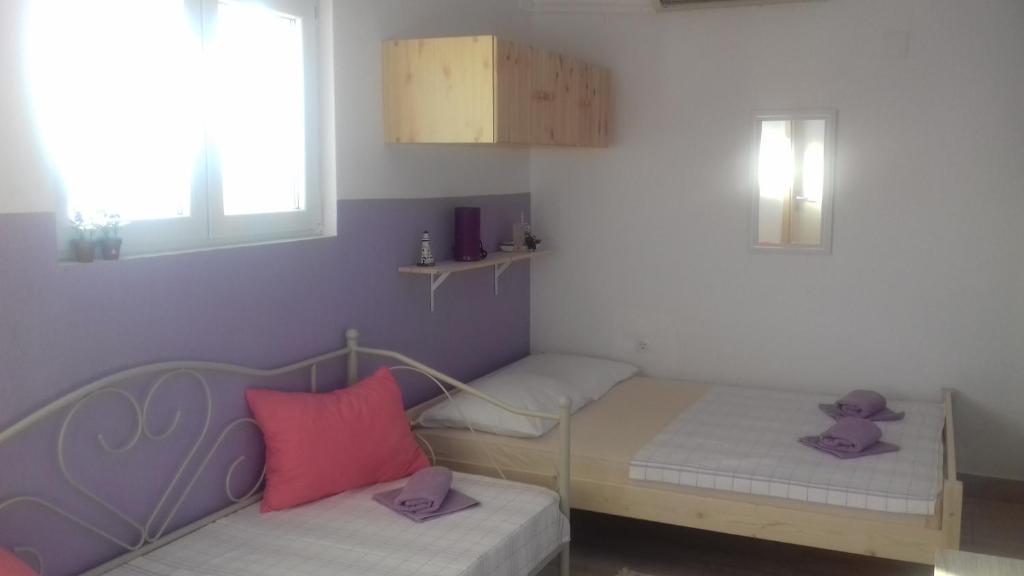 Posteľ alebo postele v izbe v ubytovaní Gospodar Apartments