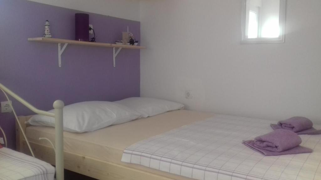 Posteľ alebo postele v izbe v ubytovaní Gospodar Apartments