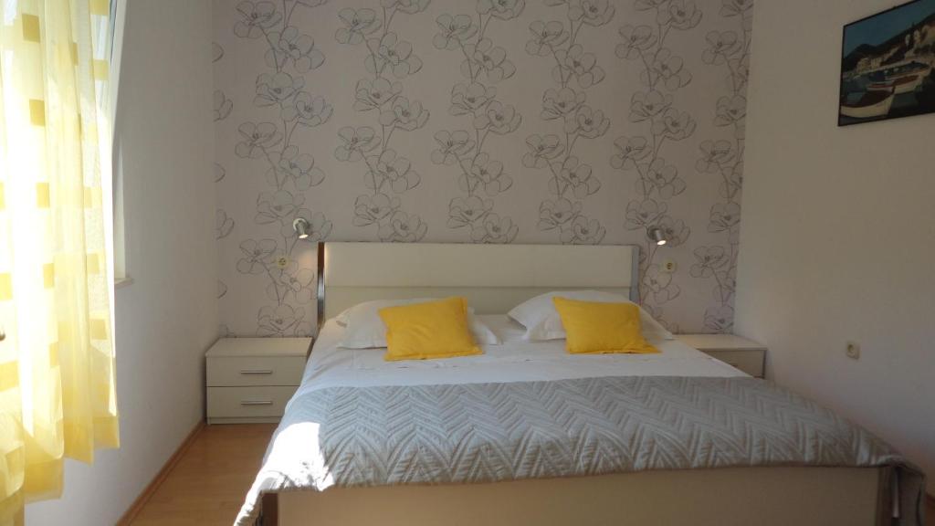 Postel nebo postele na pokoji v ubytování Guesthouse Apartment Božica