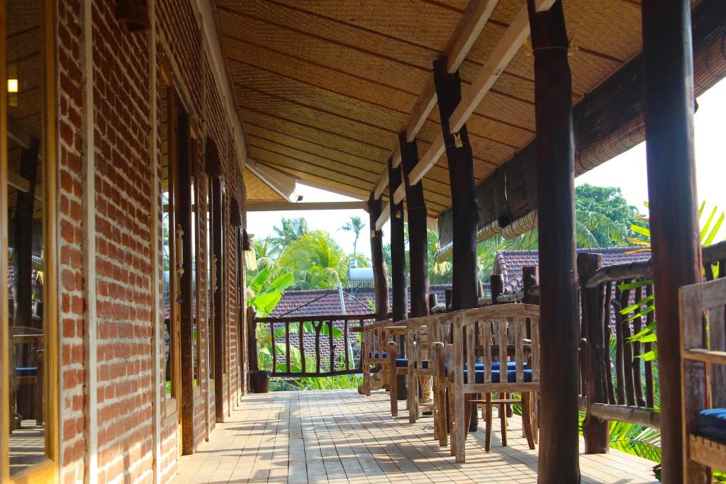 Balkón nebo terasa v ubytování Beachouse Lovina