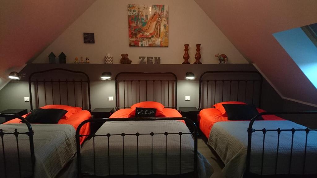 Postel nebo postele na pokoji v ubytování Domaine de la Jarrige