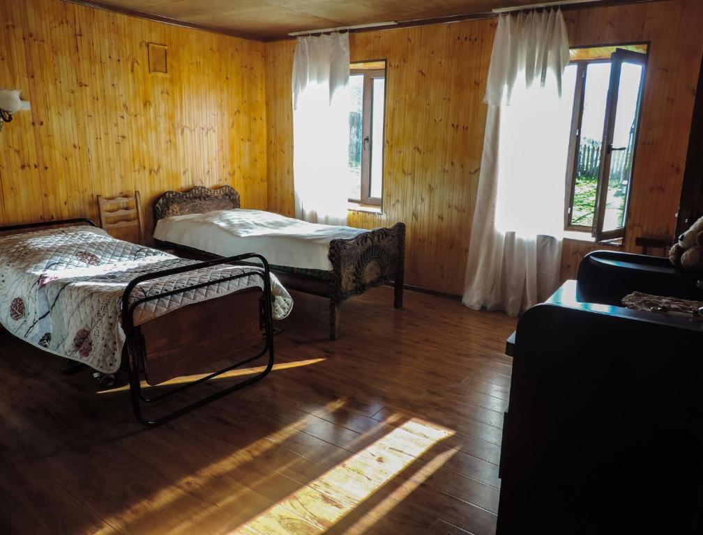 Postel nebo postele na pokoji v ubytování Guesthouse Angelina