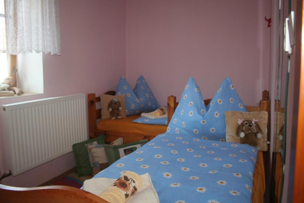 Postel nebo postele na pokoji v ubytování Chalupa u studny