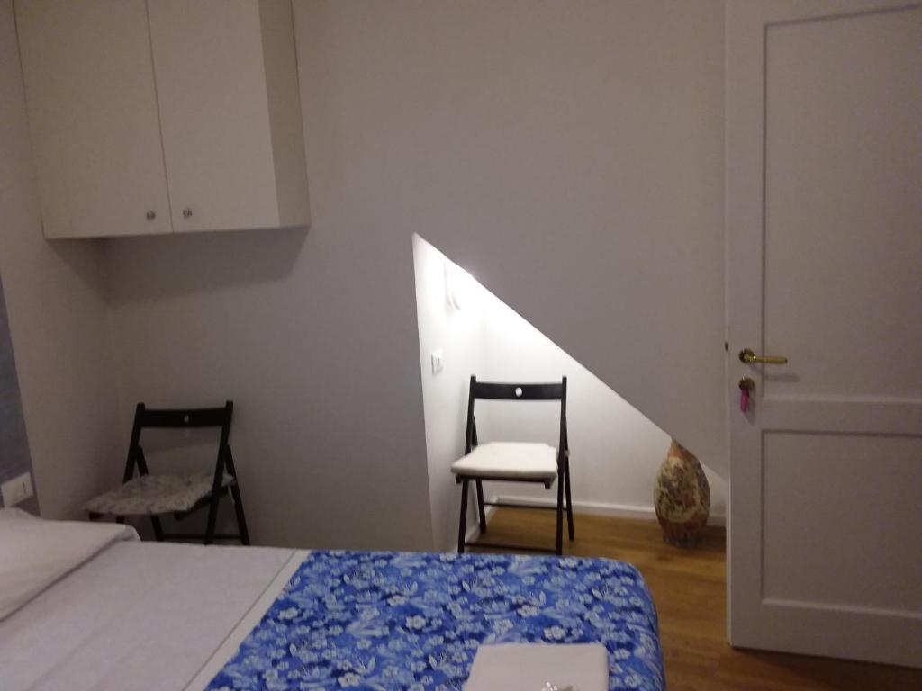 Postel nebo postele na pokoji v ubytování Rina Rooms
