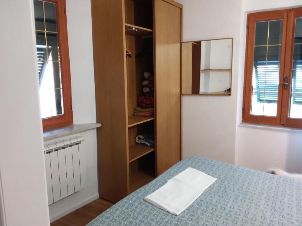 Postel nebo postele na pokoji v ubytování Rina Rooms